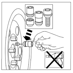 Insert the wheel lock into the empty lug nut hole, ensuring proper alignment